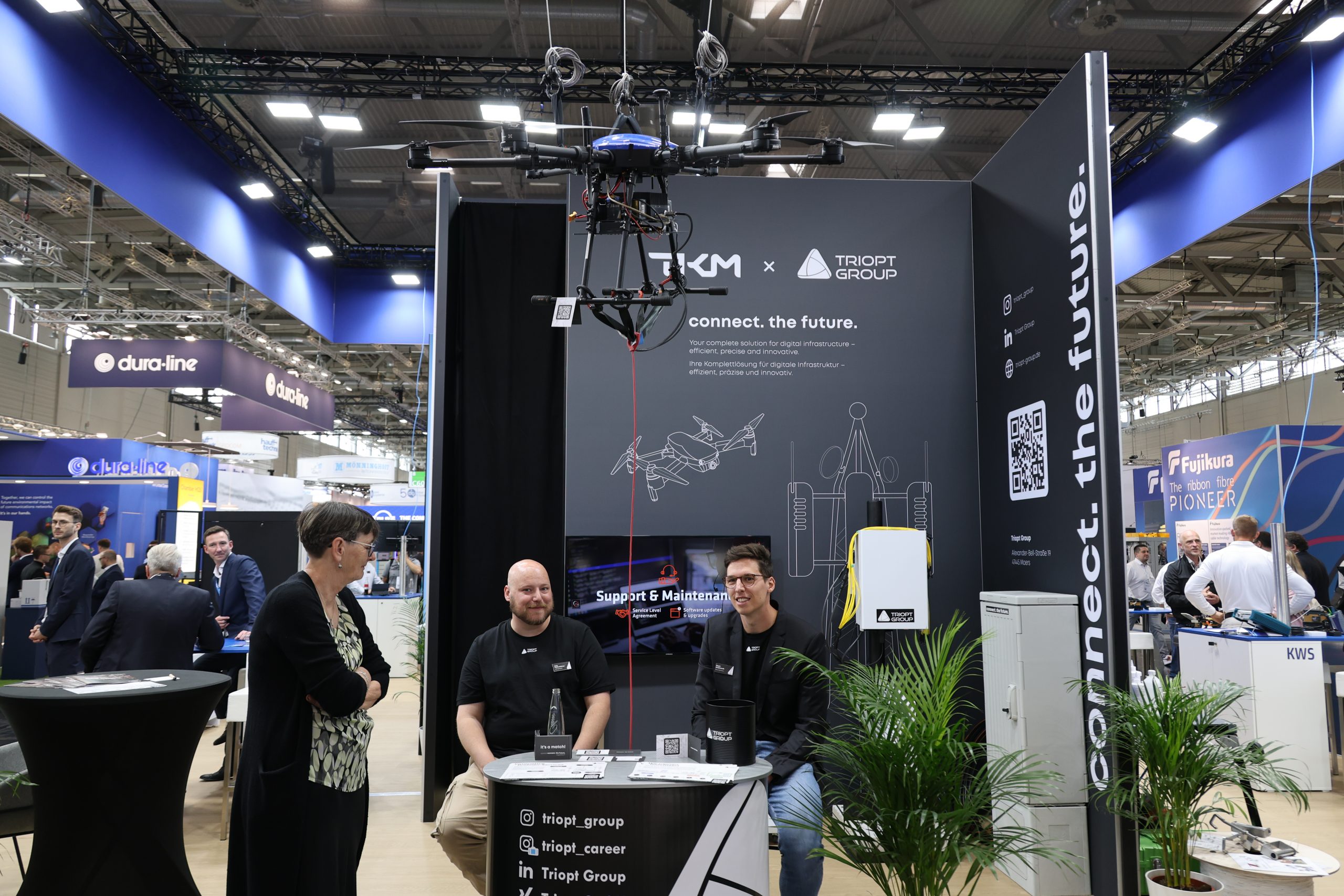 Triopt Group auf der ANGA COM 2025 in Köln.